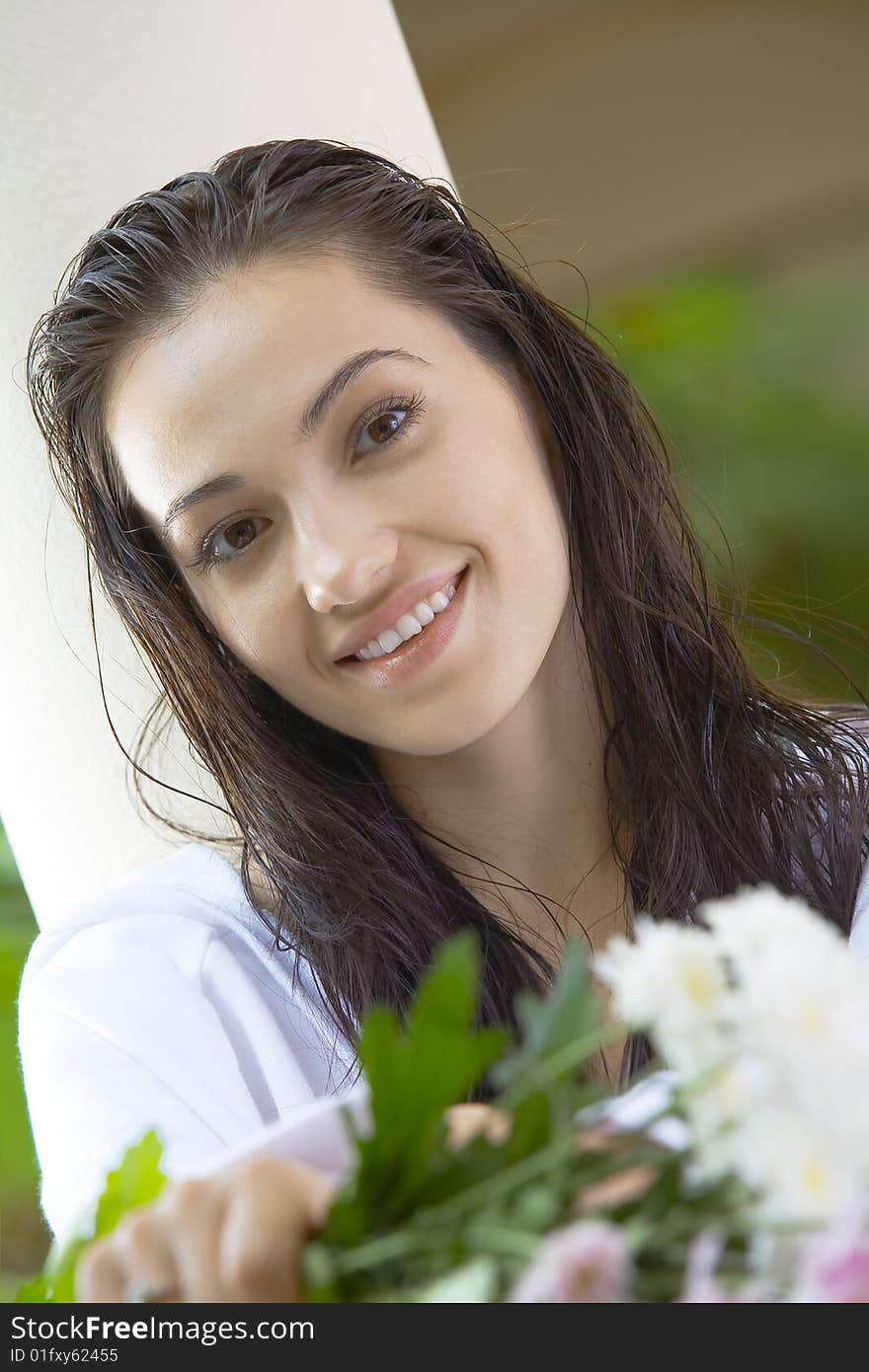 Portrait of young pretty woman in summer environment. Portrait of young pretty woman in summer environment