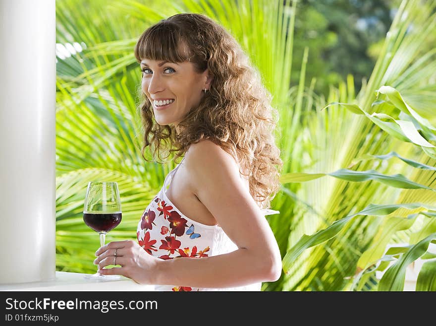 Portrait of young attractive woman having good time in tropic environment. Portrait of young attractive woman having good time in tropic environment