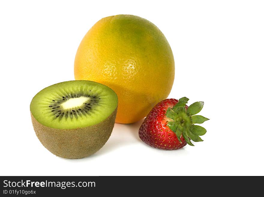 Fresh kiwi, strawberry, orange on white background. Fresh kiwi, strawberry, orange on white background