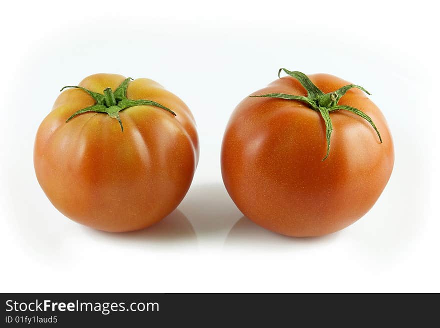 Red tomatoes on white background. Red tomatoes on white background