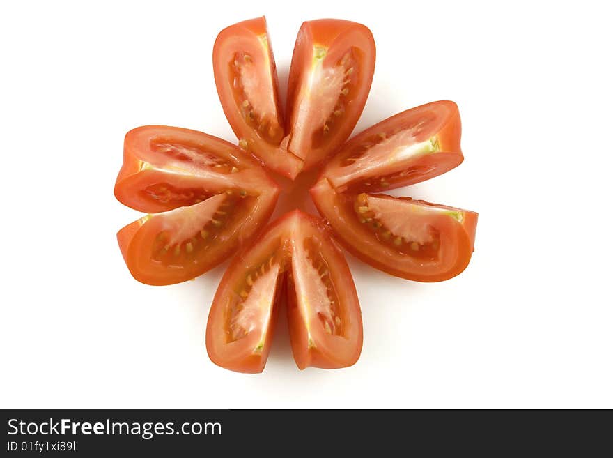 Tomato cut pieces on white background