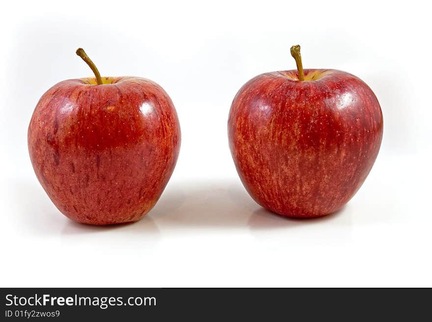 Red apples on white background