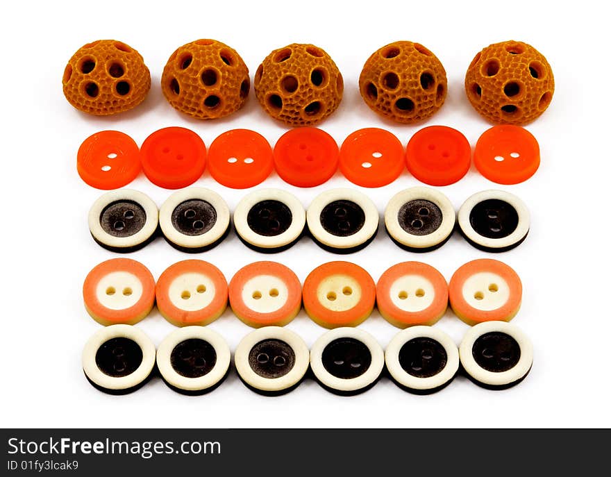 Rows of clothing buttons of different colors and shapes. Rows of clothing buttons of different colors and shapes