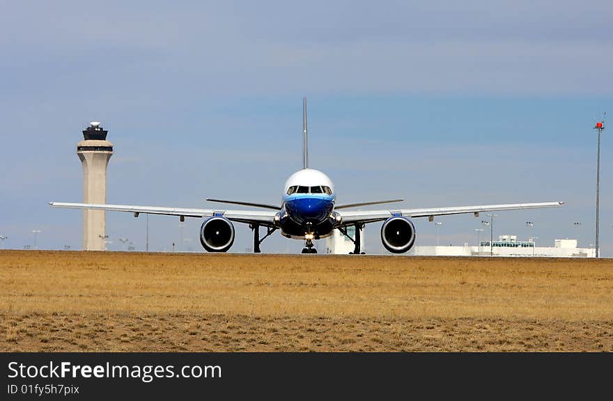 Head on view of large commercial jet on runway. Head on view of large commercial jet on runway