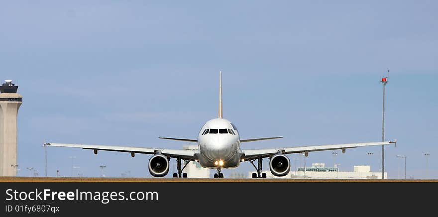 Head on commercial jet on runway