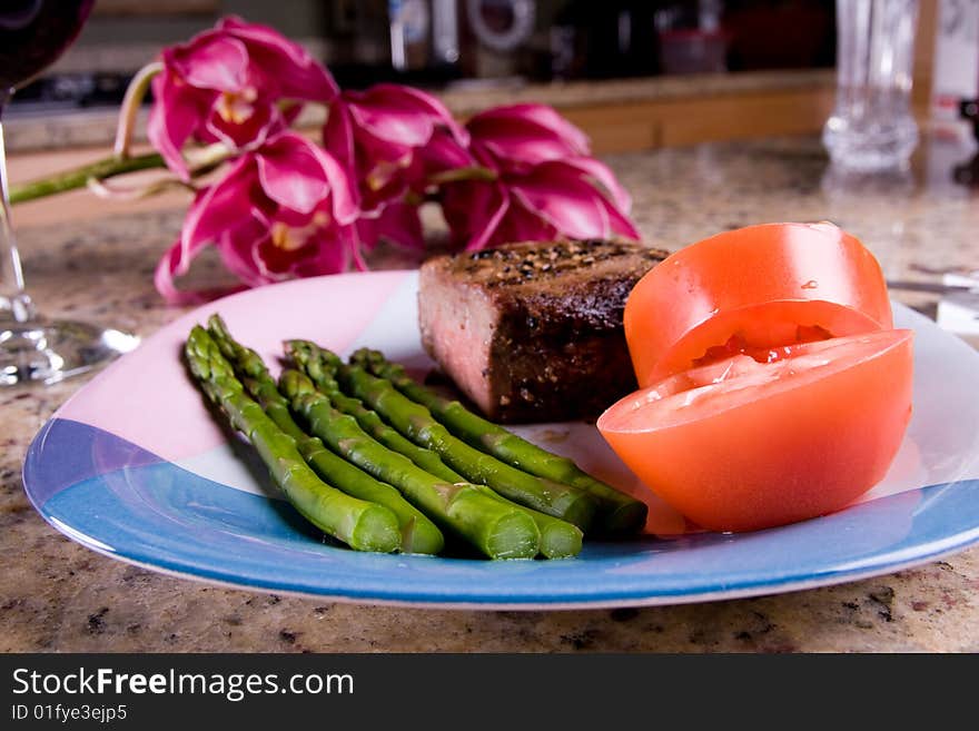 A roasted meat and a crispy vegetables serve for dinner. A roasted meat and a crispy vegetables serve for dinner