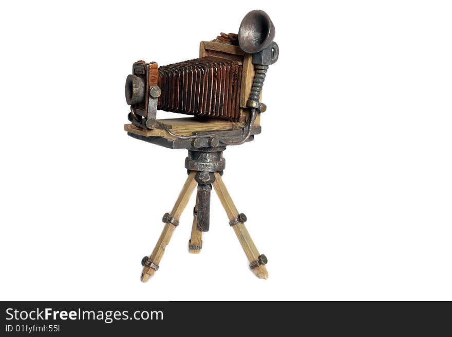 Model of old photographic camera on white background. Model of old photographic camera on white background