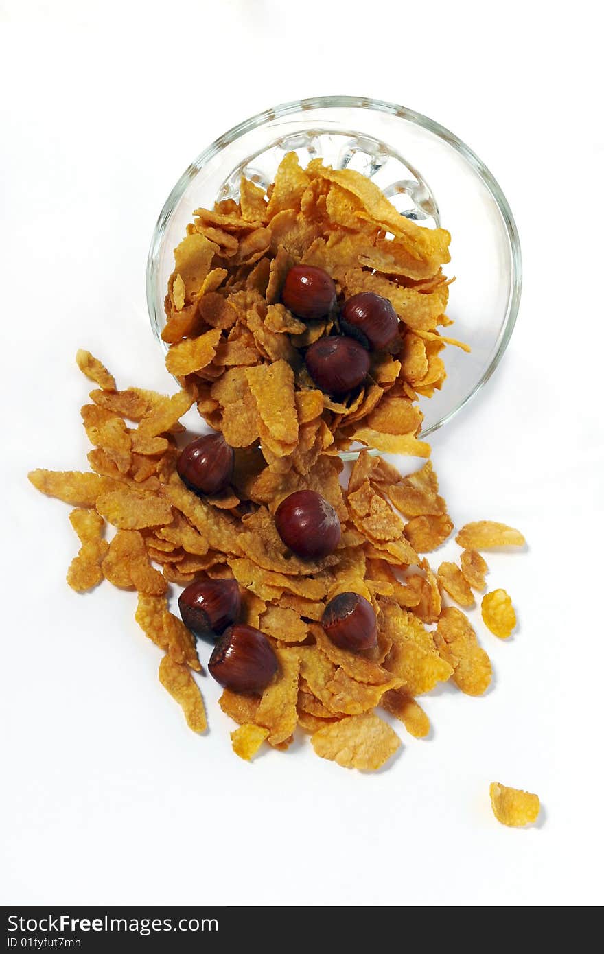 Cornflakes and nuts in bowl