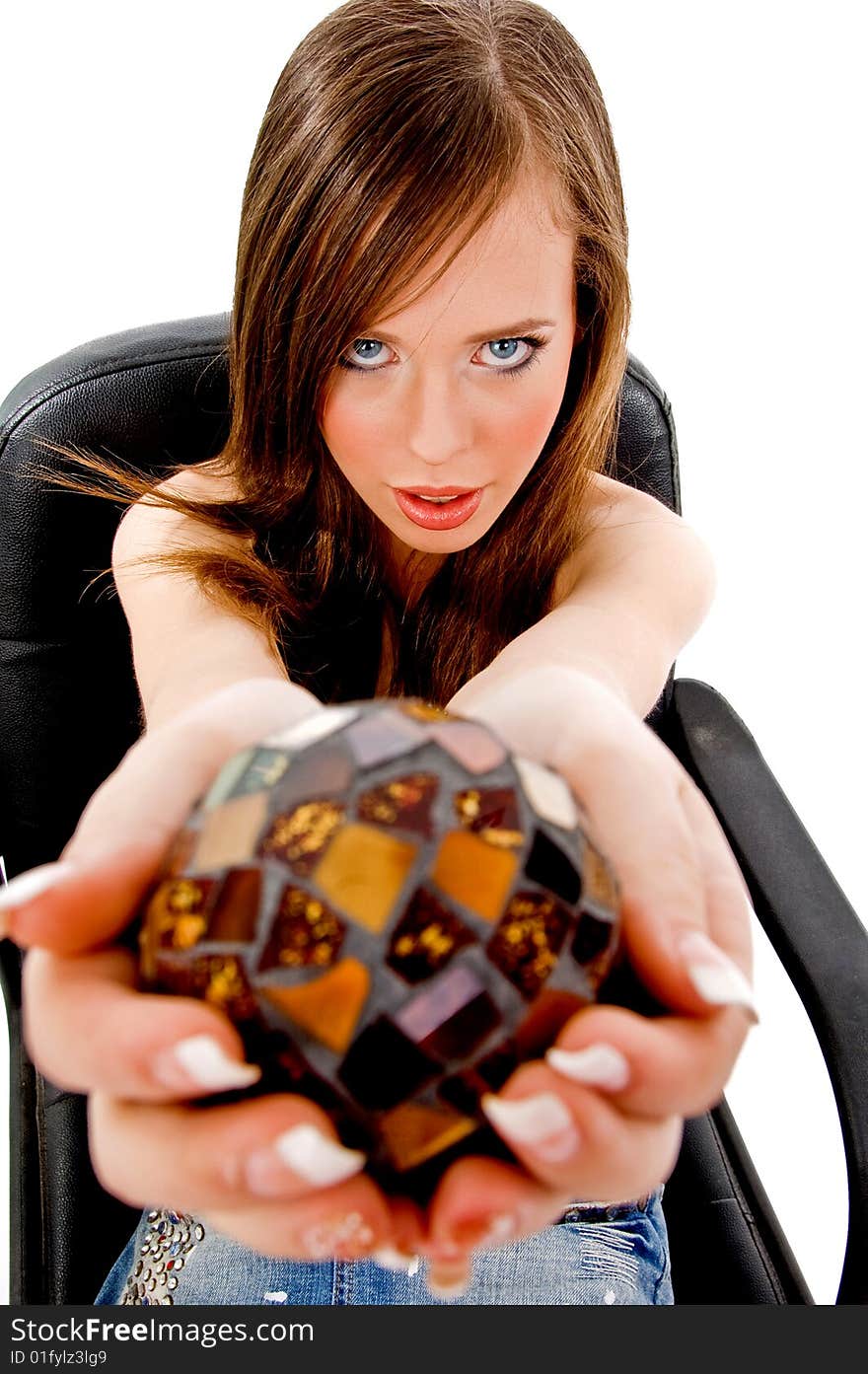 Top view of sitting woman showing christal ball against white background