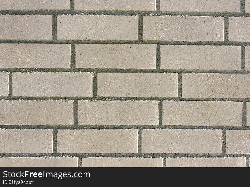 Light colored brick wall