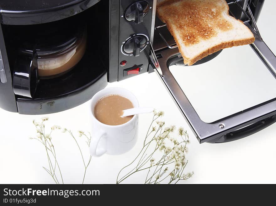 Bread and coffee finished with multi-functional breakfast machine. Bread and coffee finished with multi-functional breakfast machine