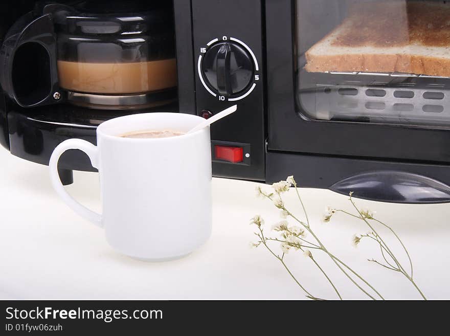 Bread and coffee finished with multi-functional breakfast machine. Bread and coffee finished with multi-functional breakfast machine