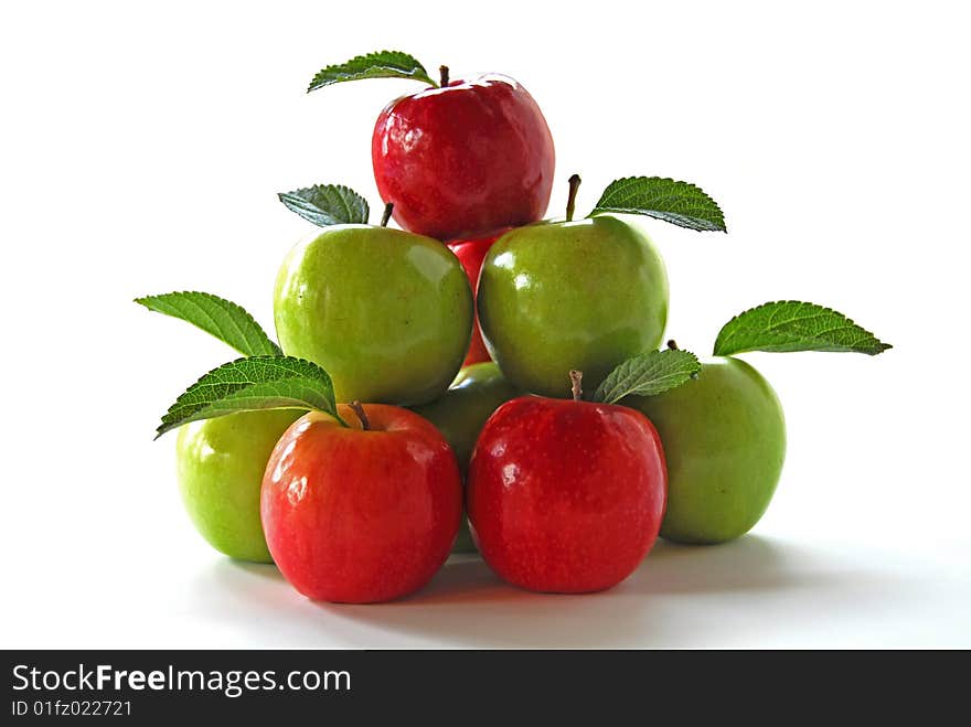 Red and Green apples in a shape of a pyramid on a white background. Red and Green apples in a shape of a pyramid on a white background