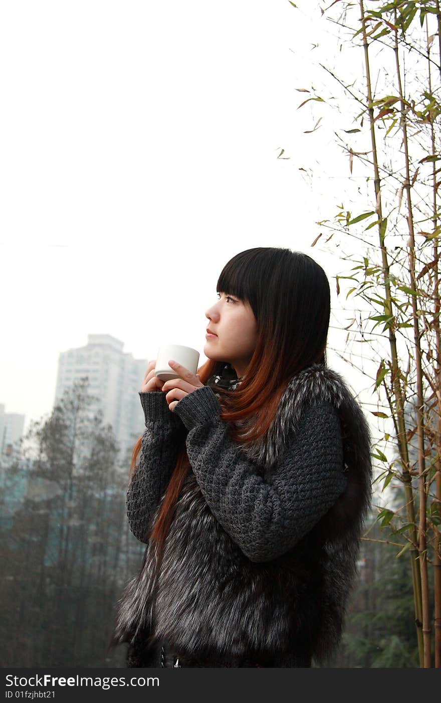 Beautiful asia woman with a cup of tea.