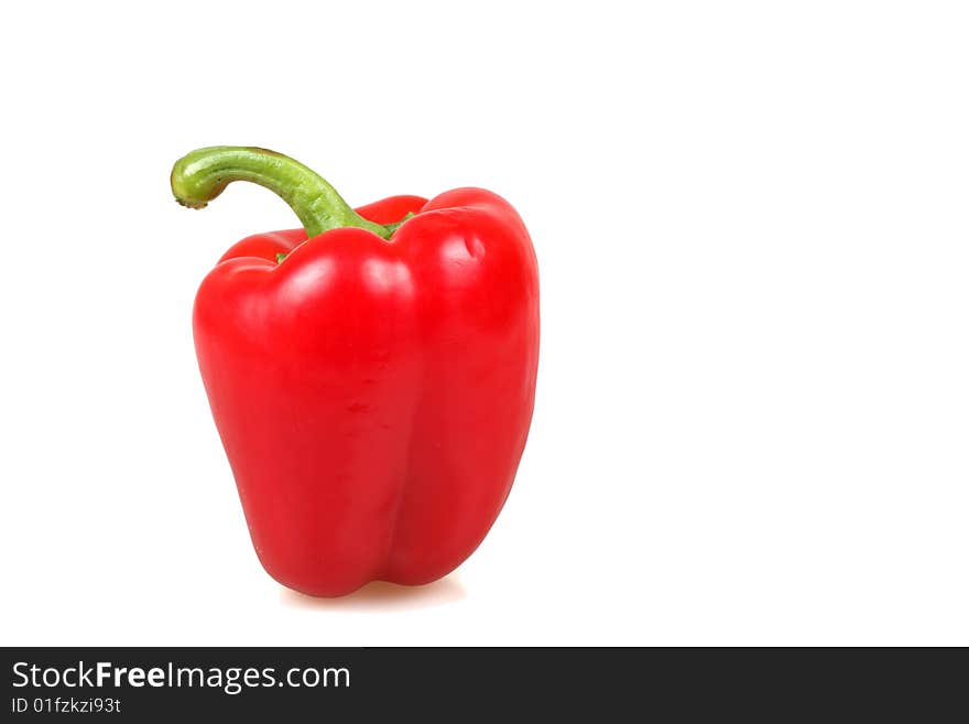 Fresh red pepper isolated on white