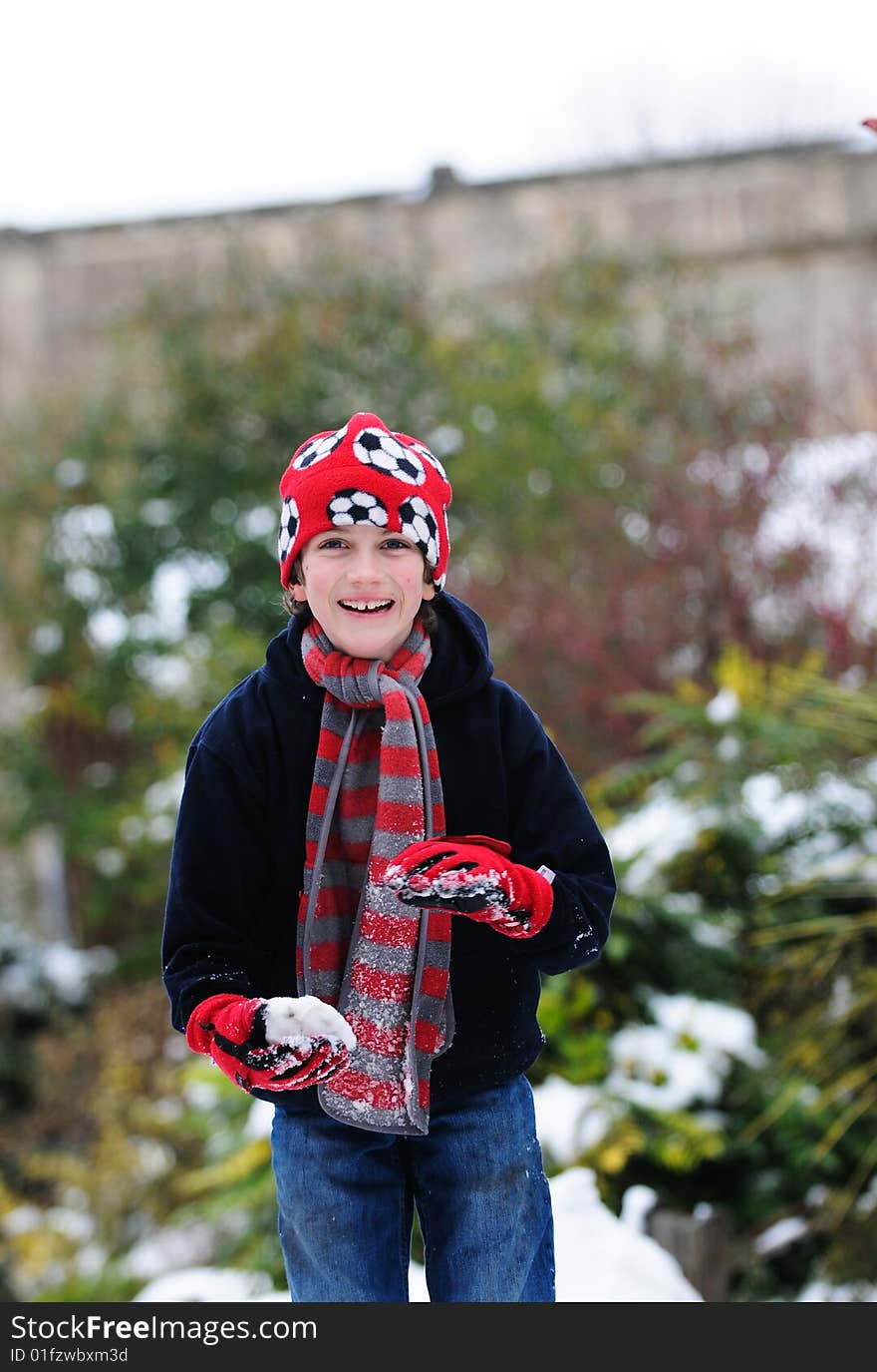 Boy making snowball