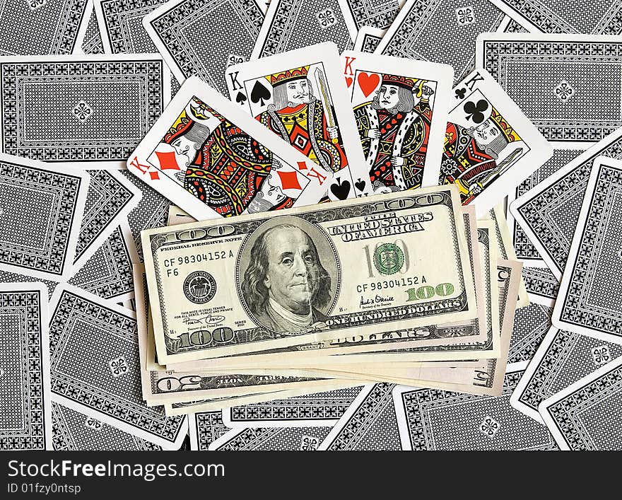 Playing cards and American dollars. Playing cards and American dollars