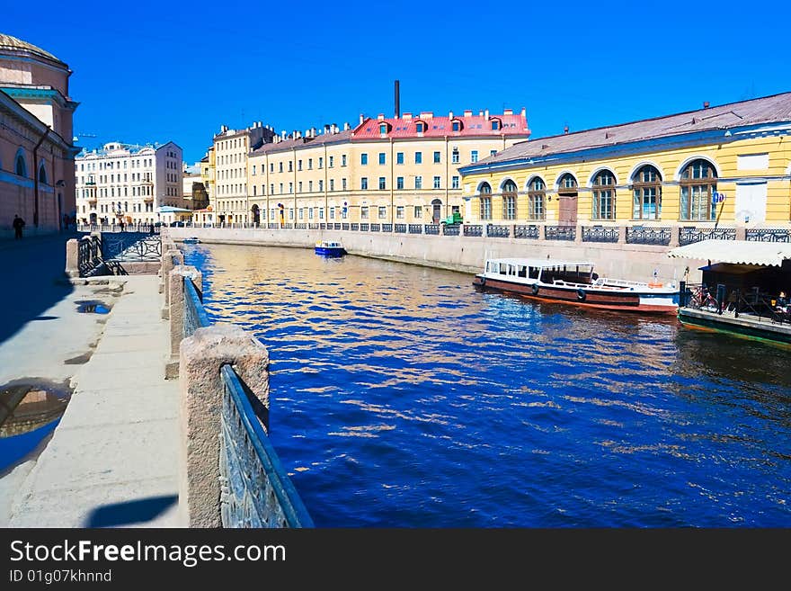 Blue water of a canal in Saint Petersburg, Russia, spring