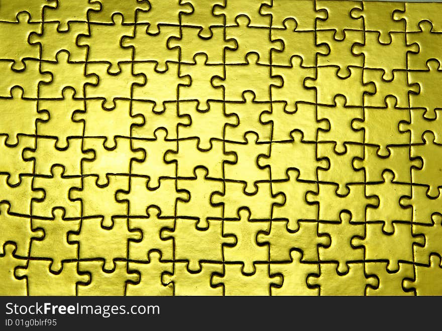 Background of gold jigsaw puzzle