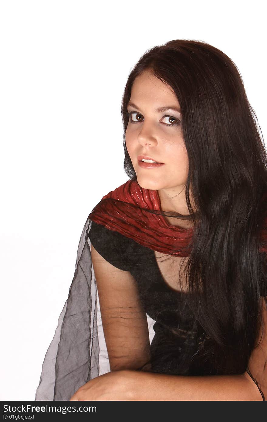 Female with long dark hair and redish scarf