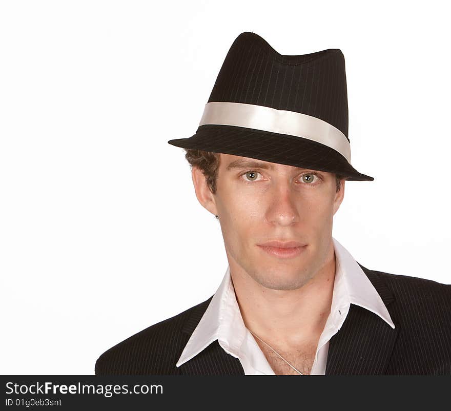 Young attractive male with black hat and suit. Young attractive male with black hat and suit