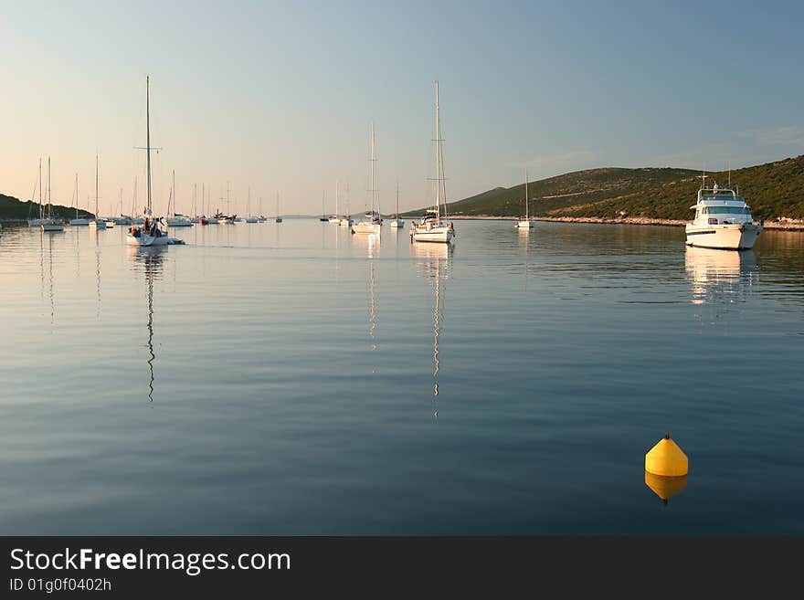 Sailing boats mooring at Croatian Islands