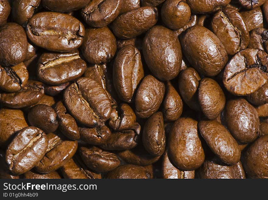 Fresh brown coffee beans background