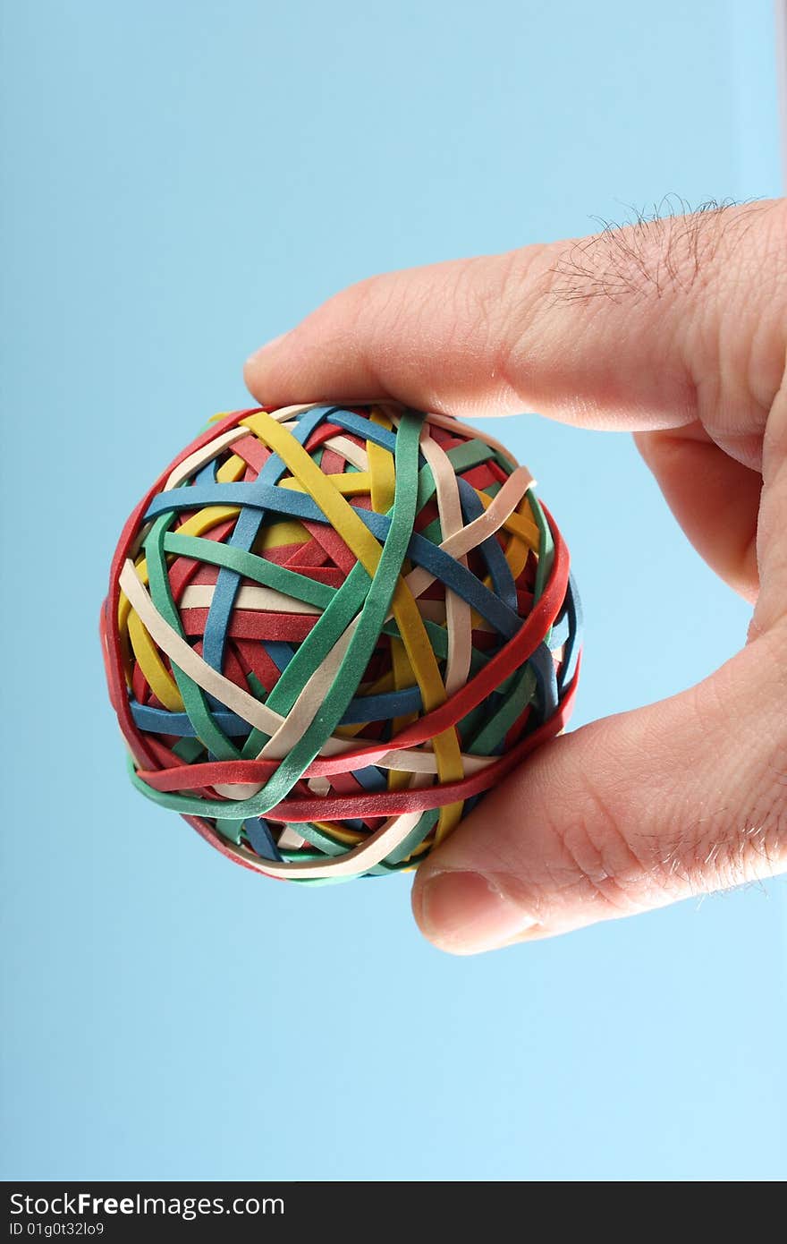 Rubber elastic ball on blue background. Rubber elastic ball on blue background