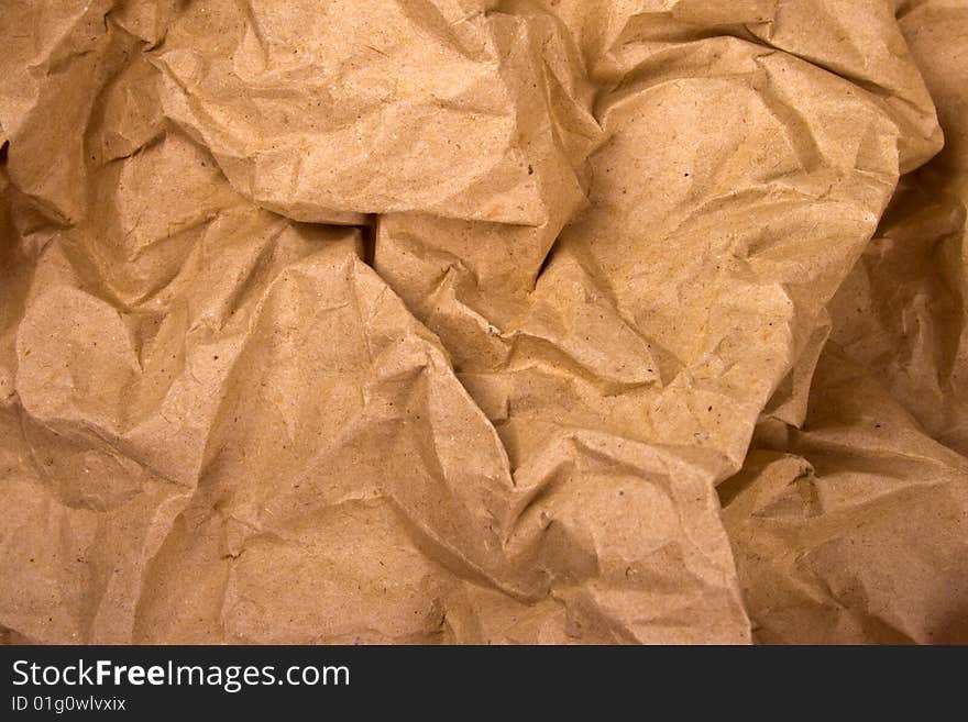 Old crumpled paper background closeup