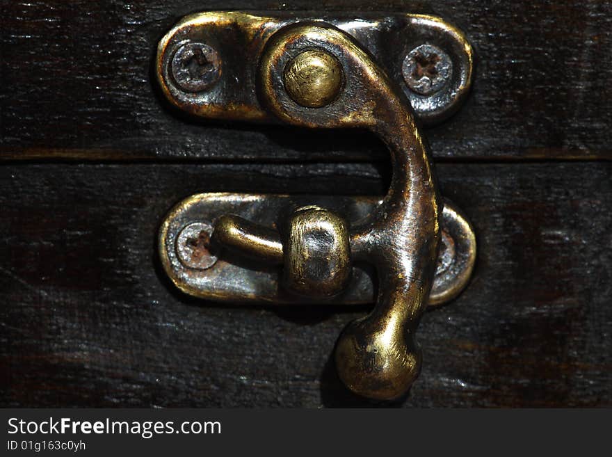 Closed ancient treasure-box lock