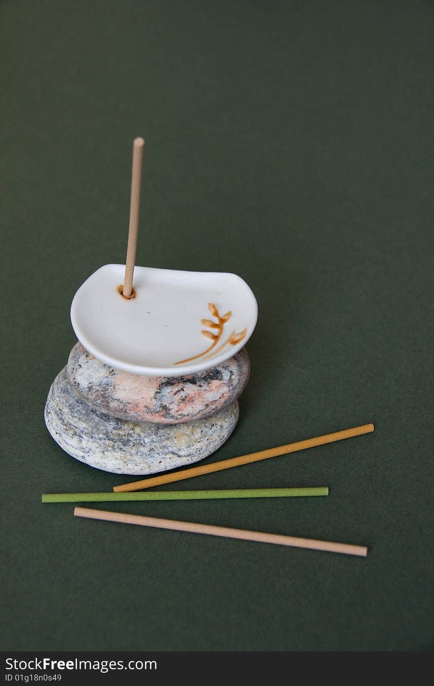 Сoloured Aromatic Sticks and White Porcelain Stand