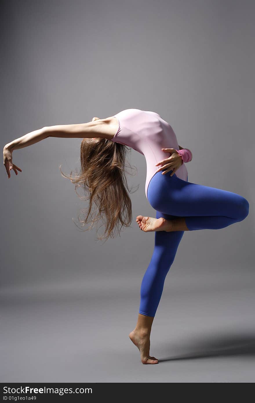 Stylish and young modern style dancer is posing