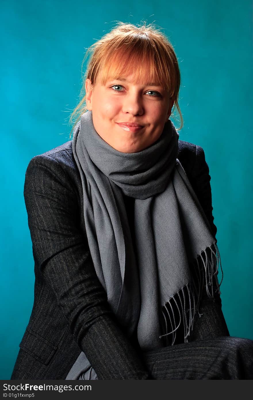 Portrait of female on a blue background in studio