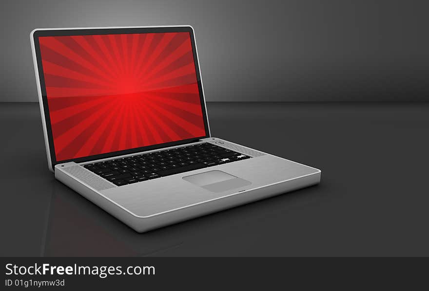 Glossy/shiny steel laptop on a gray background. All it needs is your text!. Glossy/shiny steel laptop on a gray background. All it needs is your text!