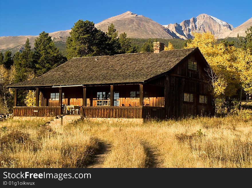 A country cabin in Colorado in Autumn with Aspen trees. A country cabin in Colorado in Autumn with Aspen trees