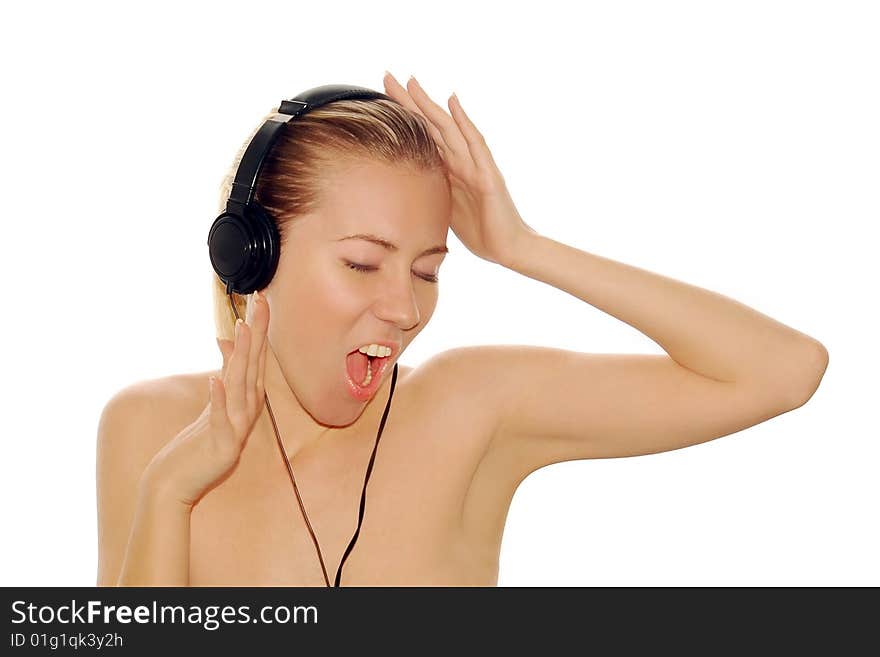 Portrait of happiness sexy young women with beautiful face in headphones and listening music on white. Portrait of happiness sexy young women with beautiful face in headphones and listening music on white