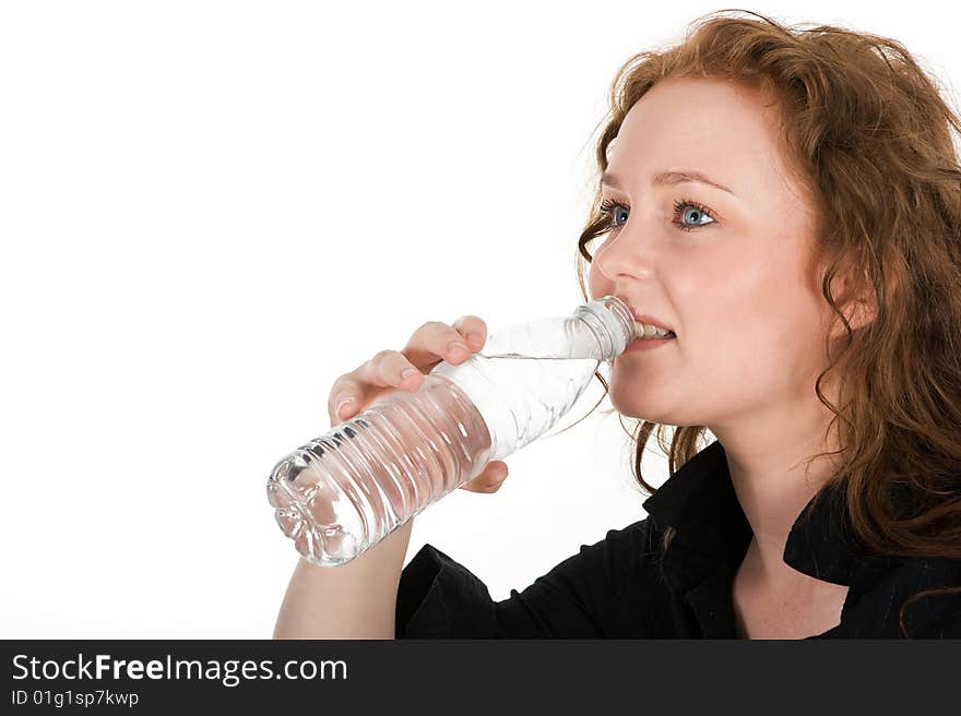 Young woman drinking mineral water