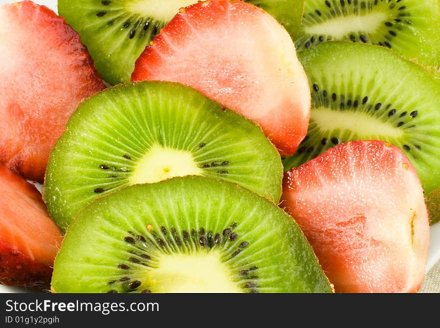 Bright slices of kiwi and strawberry. Bright slices of kiwi and strawberry