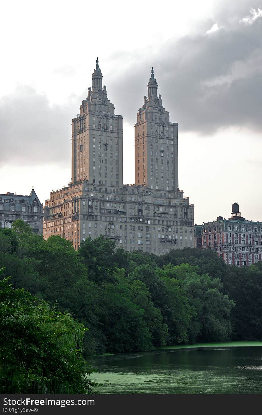 Hotel towering over central park and lake