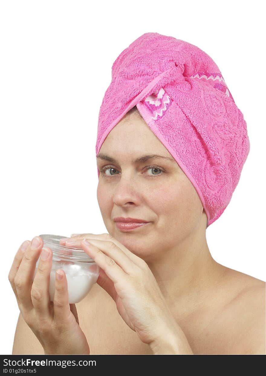 Woman with towel around head on white background