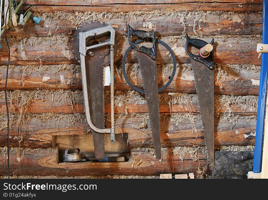 Hacksaws on a wall of the rural house