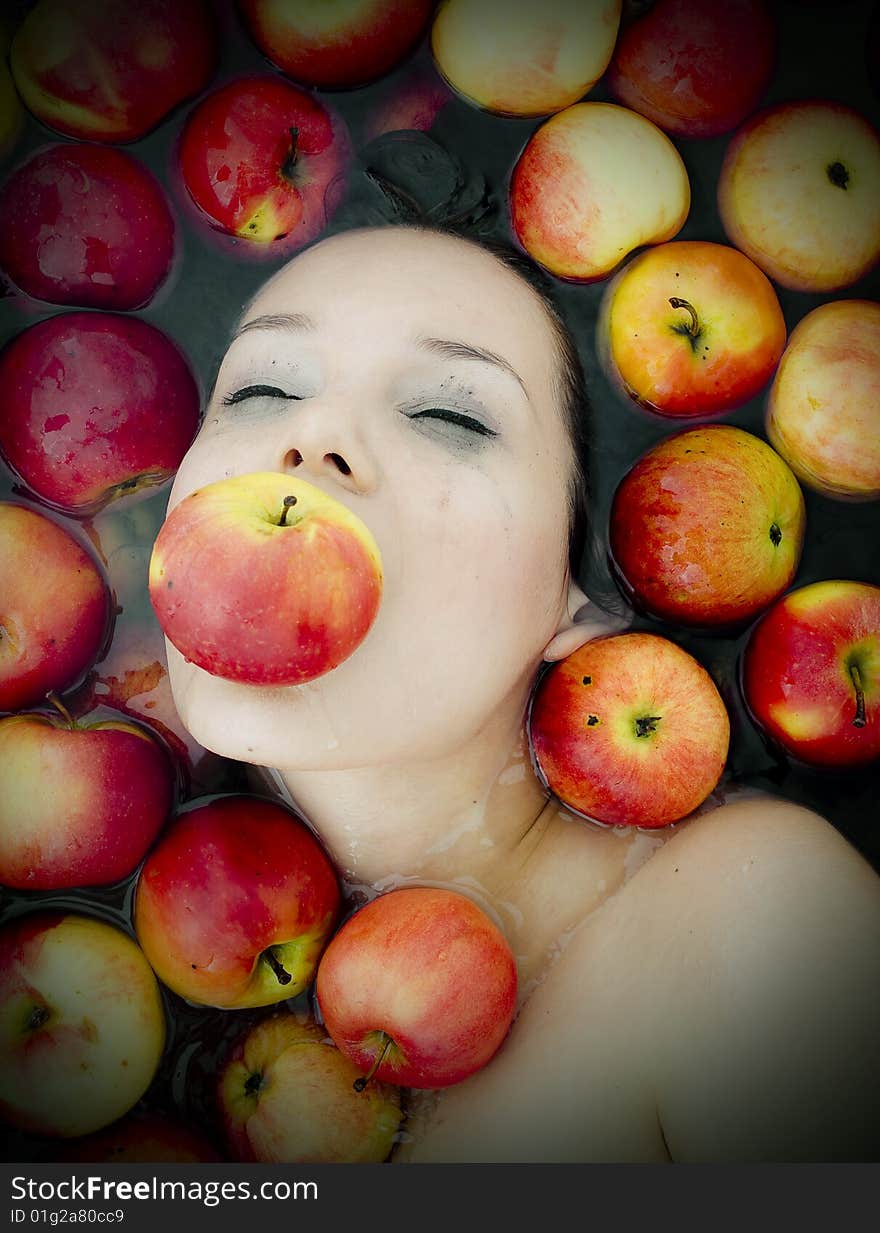 Girl in apples