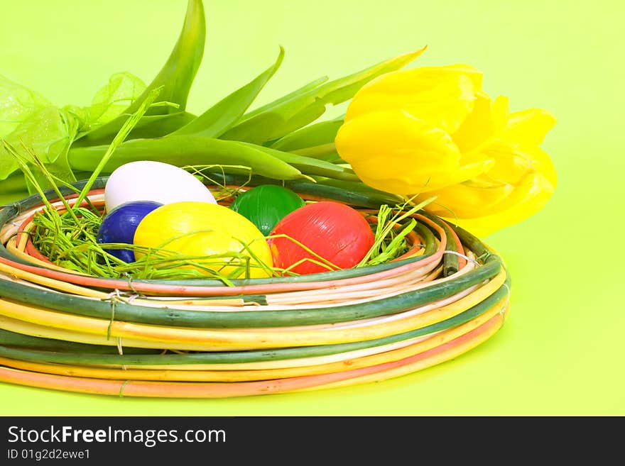 Colored Easter Eggs With Yellow Tulips