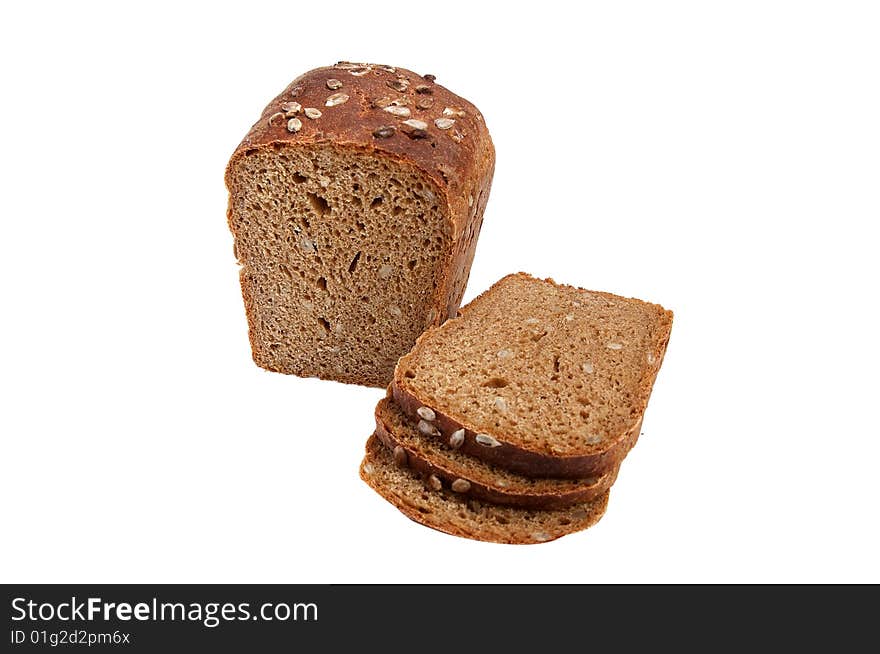 Rye bread full of seeds isolated on a white background. Rye bread full of seeds isolated on a white background.