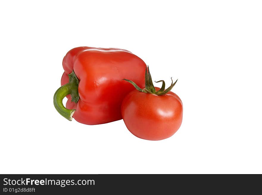 Pepper and tomato isolated  on a white background. Pepper and tomato isolated  on a white background.