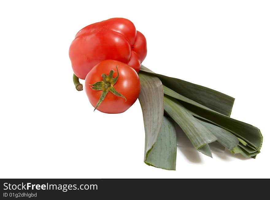 Leek,pepper and tomato on a white.