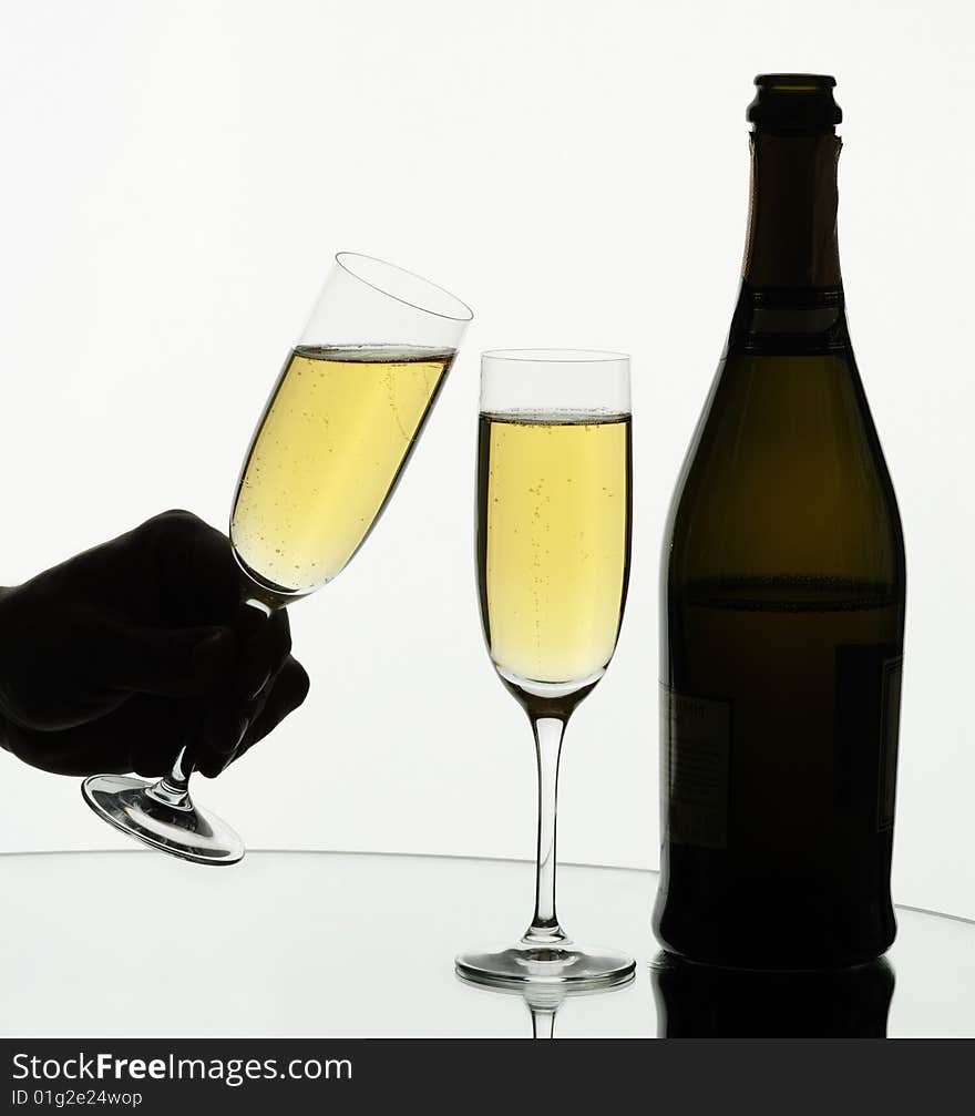 Two glasses of champagne on isolated white background