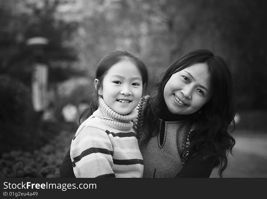 Mother and daughter in park