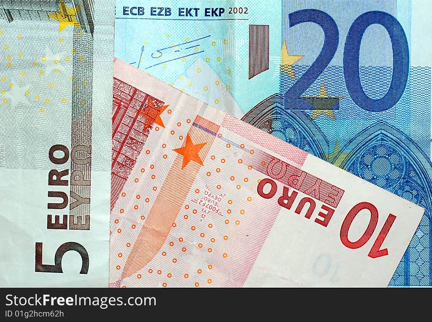 Background with five, ten and twenty euros. Background with five, ten and twenty euros