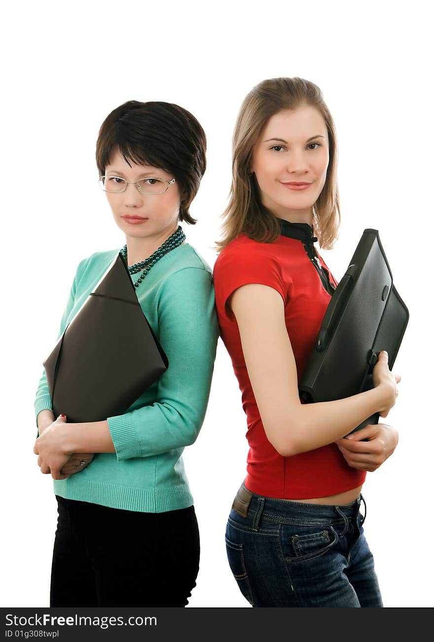 Two girls with folders; isolated on white